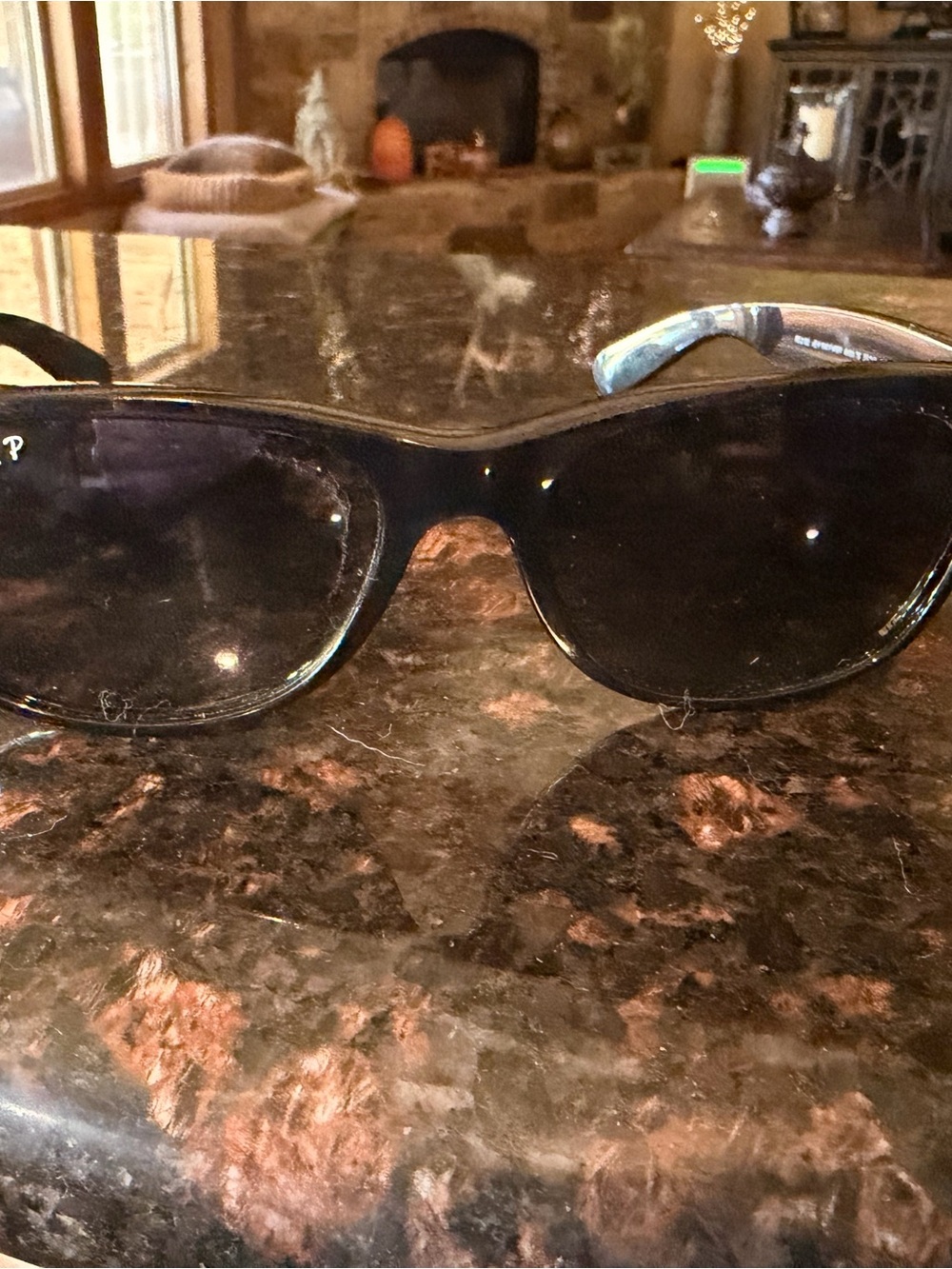 Ray-Ban Women’s Black Frame Sunglasses with Dark Lenses